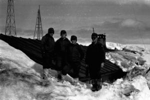 2) Three of the scientists with Norberto Bellisio at Melchior Station.